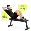 A man is performing sit-ups on a black flat bench. There are two yellow speech bubbles with text and icons indicating weight capacity. Náhľad obrázku produktu