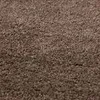 A close-up, textured view of a brown carpet. Produktbild-Vorschau