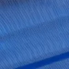 A close-up of blue fabric with a subtle pattern. Voir les images du produit
