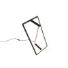 A modern LED table lamp with a geometric design. Náhľad obrázku produktu