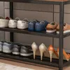 A shoe rack with several pairs of shoes on different shelves. Náhľad obrázku produktu