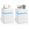 Two white nightstands with blue LED lighting. Produktbild-Vorschau
