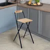 A folding bar stool is placed in a kitchen setting. Voir les images du produit
