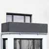 A balcony railing with a dark gray privacy screen attached. Produktbild-Vorschau