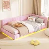 A pink corner bed with LED lighting and various pillows and blankets, set in a bedroom with a rug and a framed picture on the wall. Náhled obrázku produktu