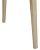 Close-up of the legs of two beige chairs. Produktbild-Vorschau