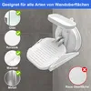 A white shower footrest is mounted on a tiled wall, with various wall surfaces indicated as compatible or incompatible. Produktbild-Vorschau