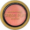 A close-up, top-down view of a round compact of Max Factor Creme Puff Blusher. Anteprima dell’immagine prodotto