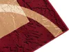 A close-up view of a rug with a modern abstract pattern. Náhled obrázku produktu