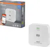 The image shows the packaging of a carbon monoxide detector and the detector itself. Produktbild-Vorschau