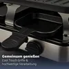 Close-up of a raclette grill with a small pan and a knob. Produktbild-Vorschau