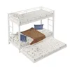 A white metal bunk bed with a pull-out trundle bed, all dressed with bedding. Podgląd zdjęcia produktu
