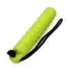 A single, bright green, cylindrical object with a textured surface and a black cord attached to one end, isolated on a white background. Produktbild-Vorschau