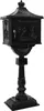 A black cast iron mailbox on a stand, shown against a white background. Voir les images du produit