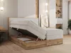 A bedroom scene with a bed that has its storage compartment open. Náhled obrázku produktu