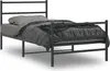 A black metal bed frame with a mattress and bedding. Podgląd zdjęcia produktu