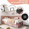 A pink upholstered bed with several callouts highlighting product features. Produktbild-Vorschau