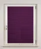 A purple pleated blind is shown in a white window frame. Produktbild-Vorschau