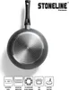 The bottom of a black frying pan with a textured, metallic base is shown against a white background. Below the pan are several icons with German text indicating product features and compatibility. Produktbild-Vorschau