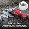 An angle grinder is shown on the ground next to some stones. Produktbild-Vorschau