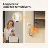 A woman is shown using her smartphone to control a towel warmer, illustrating remote temperature control. Produktbild-Vorschau