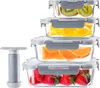 A stack of four glass food storage containers filled with fruit, with a vacuum pump next to them. Anteprima dell’immagine prodotto