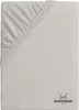 A folded fitted sheet with elastic corners.