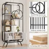 A multi-panel image showcasing a white and black bookshelf with decorative elements and material details. Produktbild-Vorschau