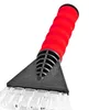 Close-up of an ice scraper with a red handle. Produktbild-Vorschau