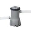 A gray pool pump with two white hoses attached, shown against a white background. Produktbild-Vorschau