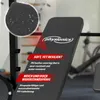 A close-up view of a black fitness bench with text overlays highlighting its features. Podgląd zdjęcia produktu