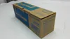 A cardboard box for a printer toner cartridge, placed on a light gray surface. Anteprima dell’immagine prodotto