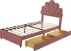 A pink upholstered twin bed frame with a scalloped headboard and two pull-out drawers underneath, shown against a white background. Produktbild-Vorschau