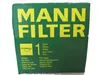 The image shows the green packaging of a MANN FILTER oil filter. The packaging has yellow text and a yellow icon. Podgląd zdjęcia produktu