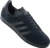 A single black Adidas Gazelle sneaker is shown against a white background. Voir les images du produit