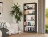 A living room scene with a bookshelf, sofa, and coffee table. Voir les images du produit