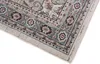 A close-up corner of a rug with a detailed pattern. Produktbild-Vorschau
