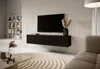A modern living room with a wall-mounted TV and media console. Náhľad obrázku produktu