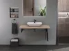 A modern bathroom with a wall-mounted sink and vanity. Produktbild-Vorschau
