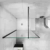 A modern bathroom with a glass shower enclosure. Produktbild-Vorschau