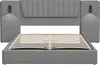 A grey upholstered bed frame with a slatted base and integrated headboard with reading lights and USB charging ports. Produktbild-Vorschau