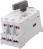 A white electrical switch with a gray handle and copper terminals. Produktbild-Vorschau