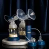 A set of Neno Camino double electric breast pumps with accessories, displayed on a marble stand against a dark blue velvet background. Podgląd zdjęcia produktu