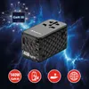 A black Verbatim universal travel adapter with multiple USB-C and USB ports is shown against a background of blue lightning. Anteprima dell’immagine prodotto