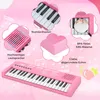 A pink toy piano keyboard with various close-up shots highlighting its features, set against a background with musical notes and a heart graphic. Produktbild-Vorschau