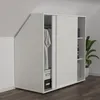 A white wardrobe with sliding doors is shown in an attic room. A white t-shirt is hanging inside, and storage boxes are below. Anteprima dell’immagine prodotto