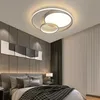 A modern bedroom with a stylish ceiling light. Náhled obrázku produktu