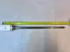 A heating element with a thermostat is placed on a white background next to a measuring tape. Anteprima dell’immagine prodotto