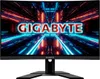 A curved computer monitor displaying a futuristic, neon-lit tunnel with the GIGABYTE logo prominently featured. Voir les images du produit