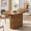 A dining table with chairs in a well-lit room. Podgląd zdjęcia produktu